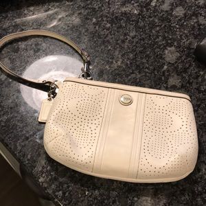 Cream Coach wristlet